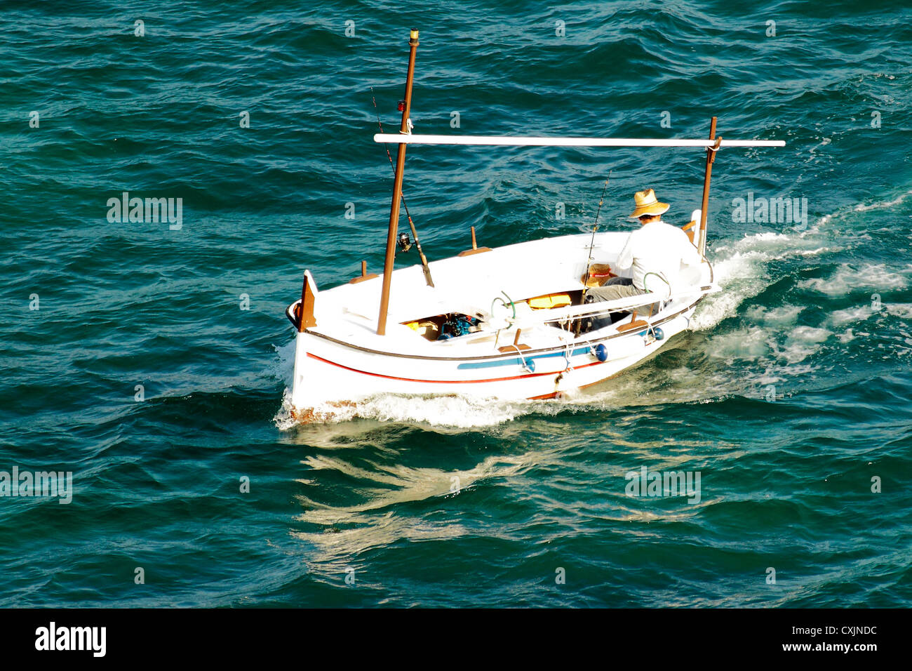 fisherman in his boat Stock Photo