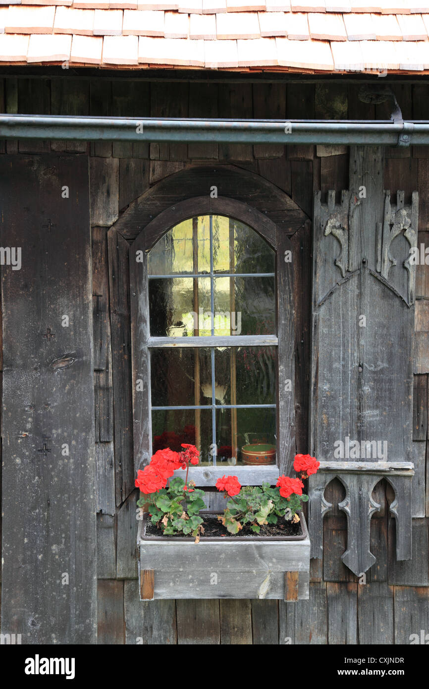 window with Geranium flowers at wooden house, Lower Bavaria, Germany ...