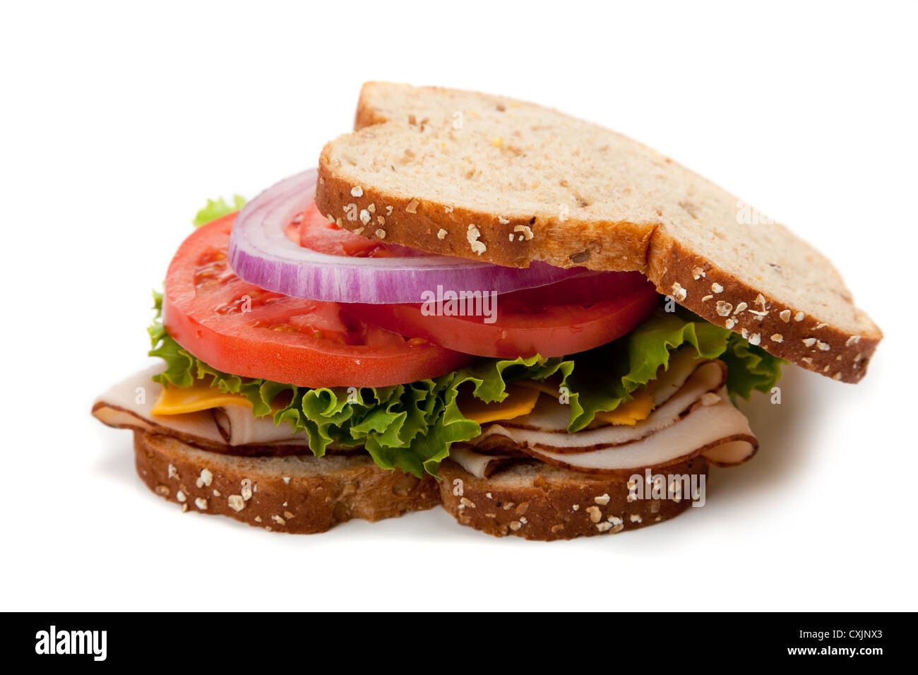 Turkey sandwich on wheat bread on a white background Stock Photo Alamy
