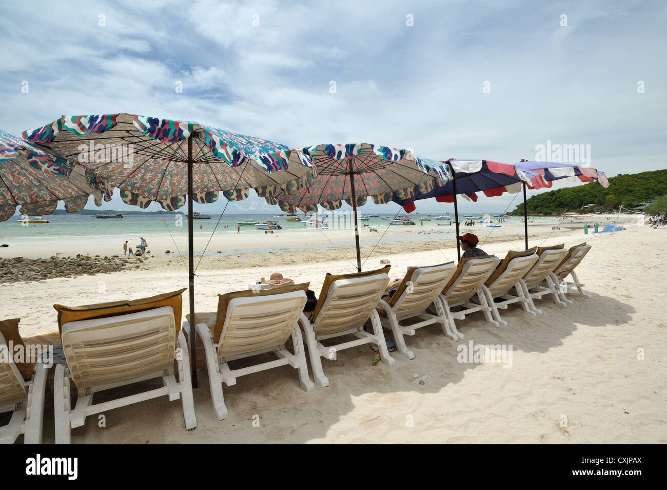 Relaxing beach umbrella Stock Photo