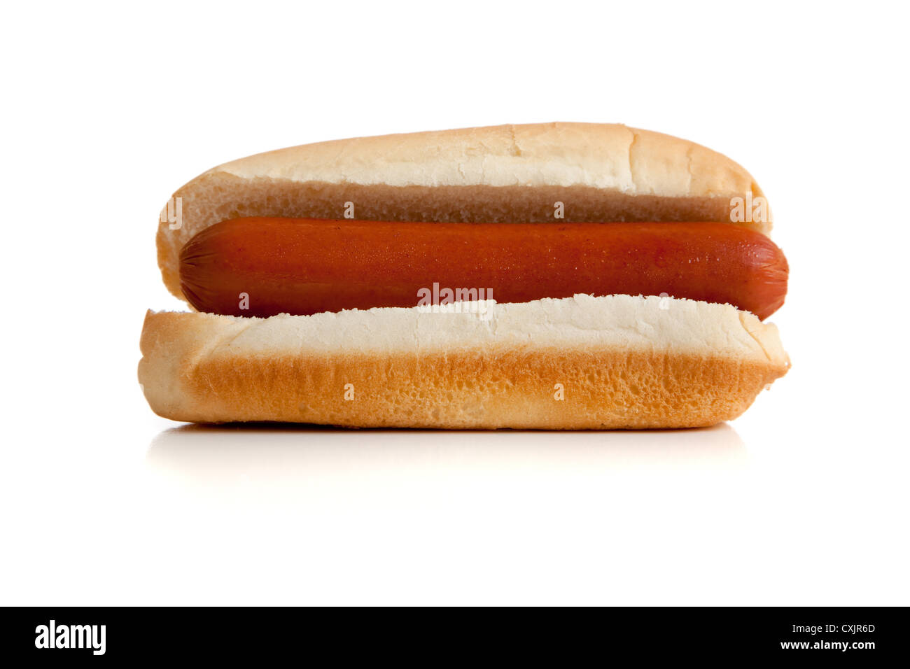 A single hot dog in a bun on a whitek background Stock Photo