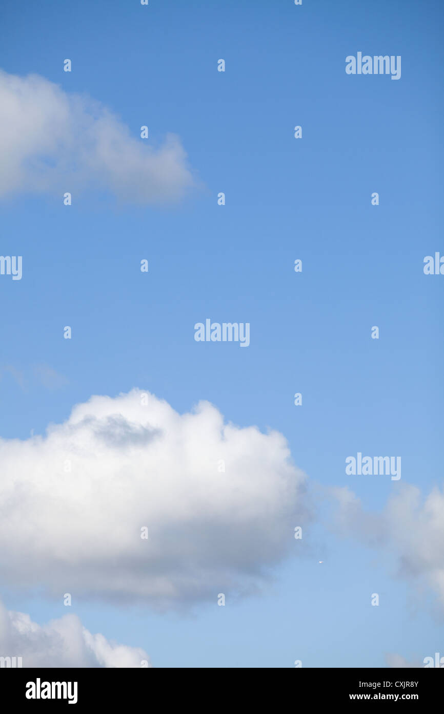 Deep blue sky background with white clouds Stock Photo - Alamy