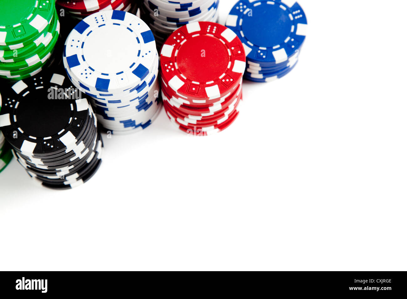 Stacks of colored poker chips on a white background with copy space