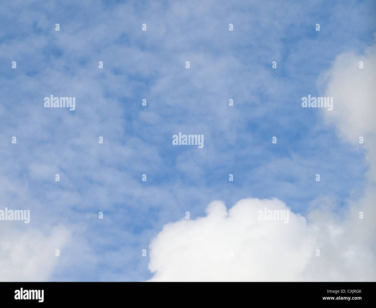 Deep blue sky background with white clouds Stock Photo - Alamy