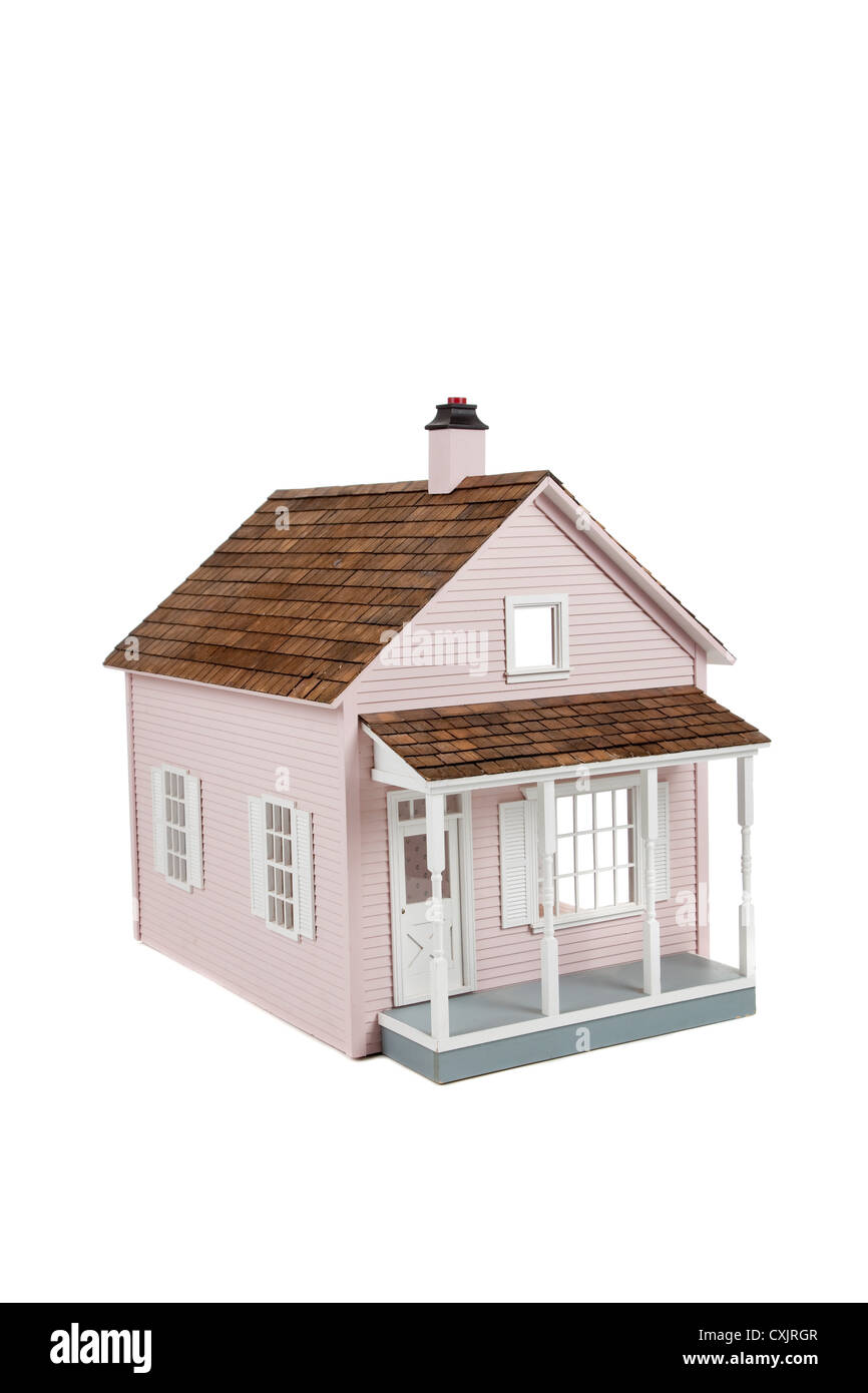 Pink wooden doll house on a white background Stock Photo