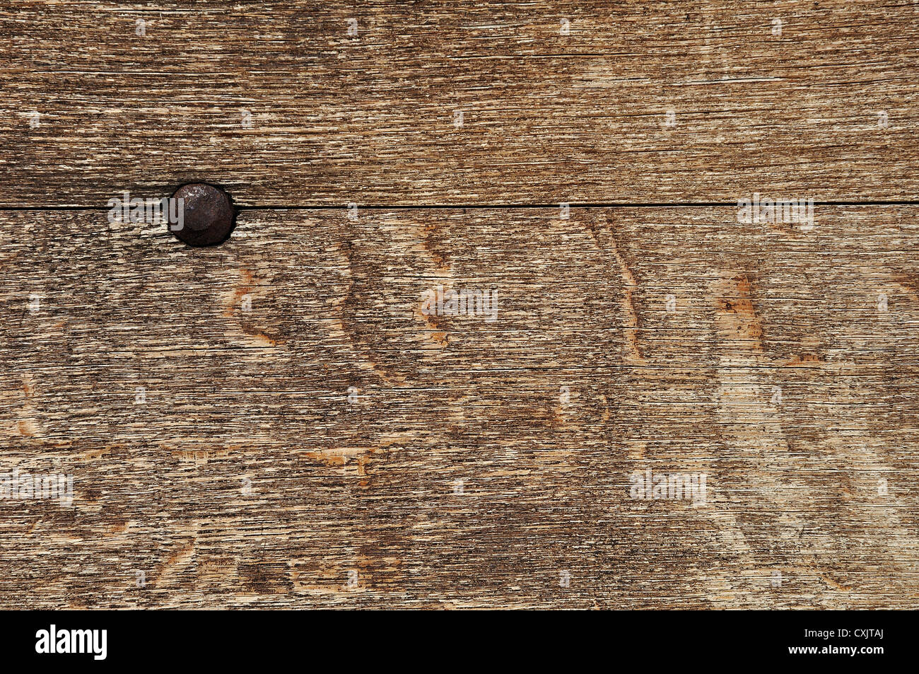 Wooden board with rivet Stock Photo