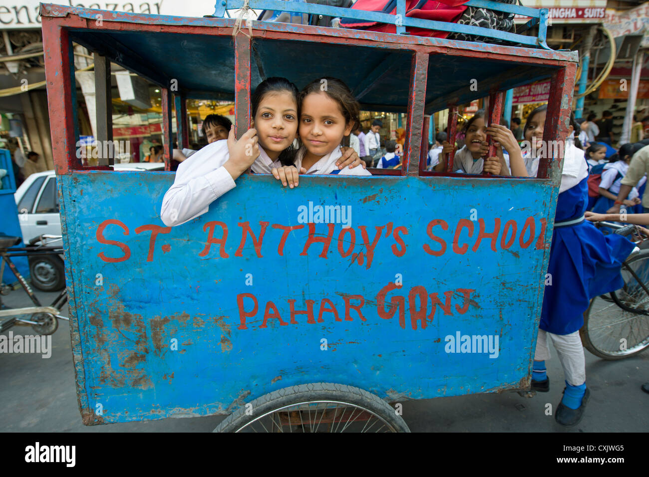 Pupils in a Cycle-rickshaw 'school bus' for St Anthony's School on ...