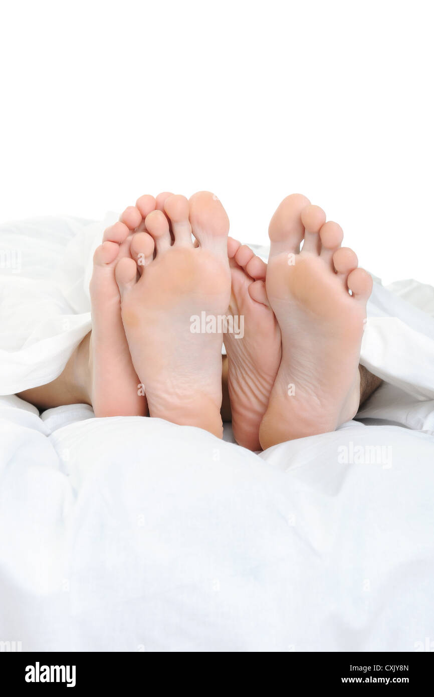Man lying down feet up bed hires stock photography and images Alamy