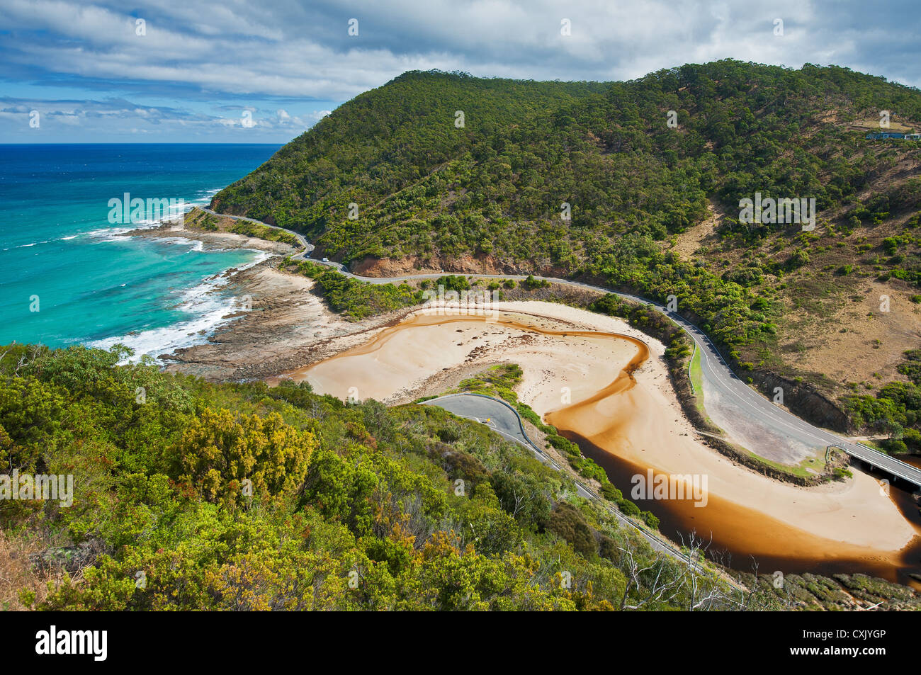 The Great Ocean Road winding its way along the coastline. Stock Photo