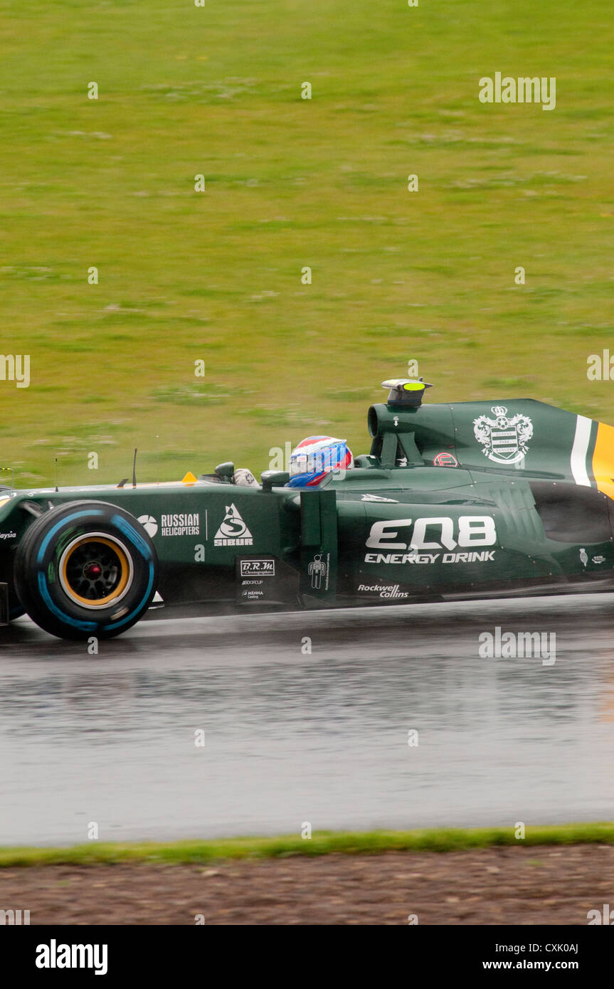 Vitaly Petrov in his Caterham F1 Car in the Wet Stock Photo