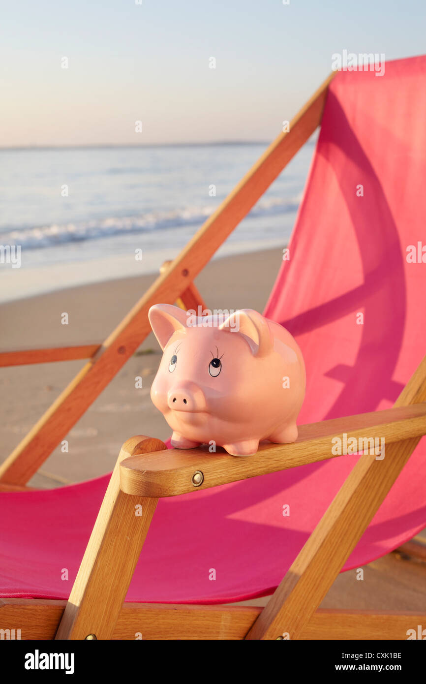 Piggy Bank on Beach Chair, Biscarrosse, Landes, Aquitaine, France Stock Photo