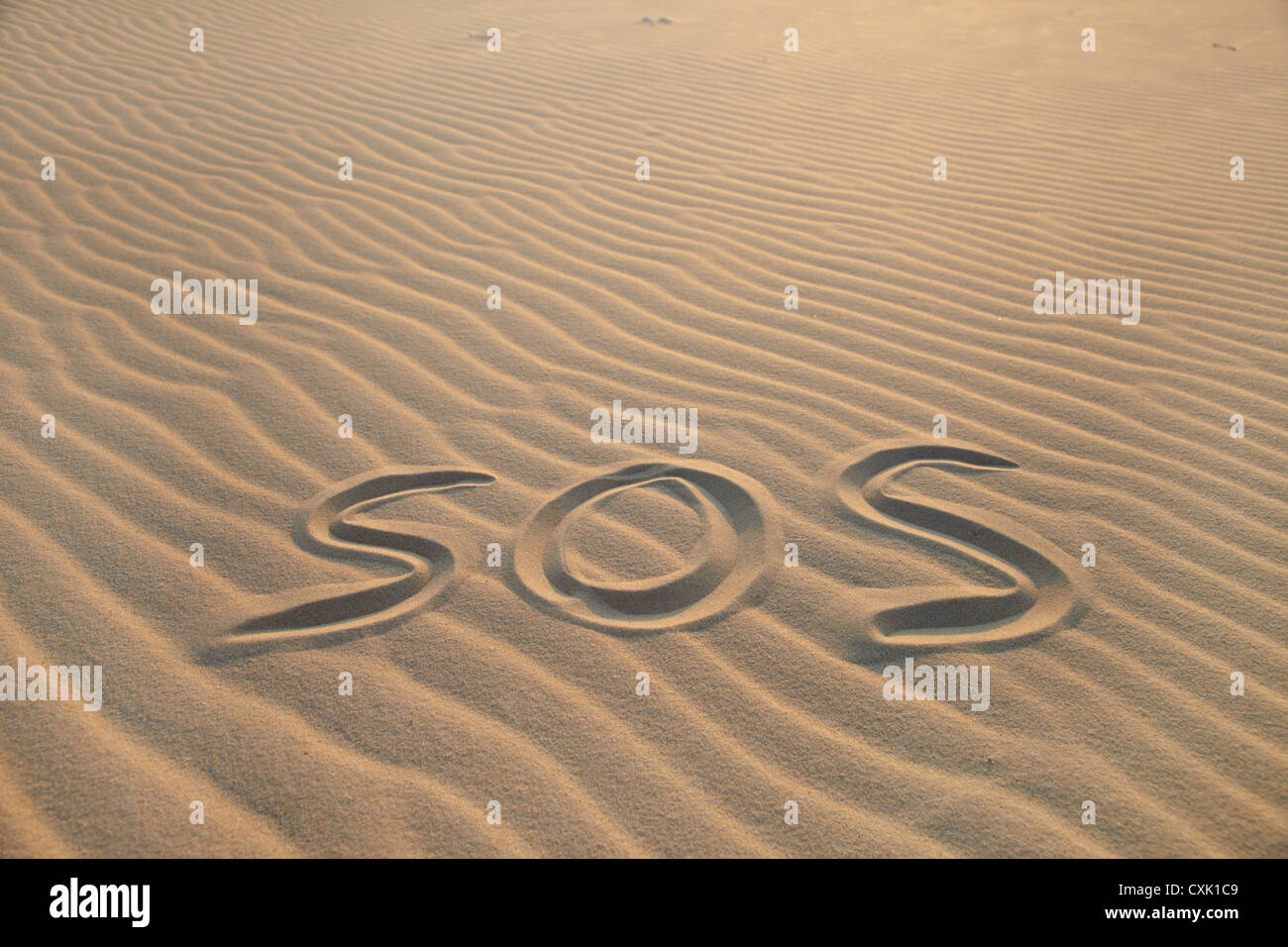 SOS Drawing on Sand, Biscarrosse, Landes, Aquitaine, France Stock Photo