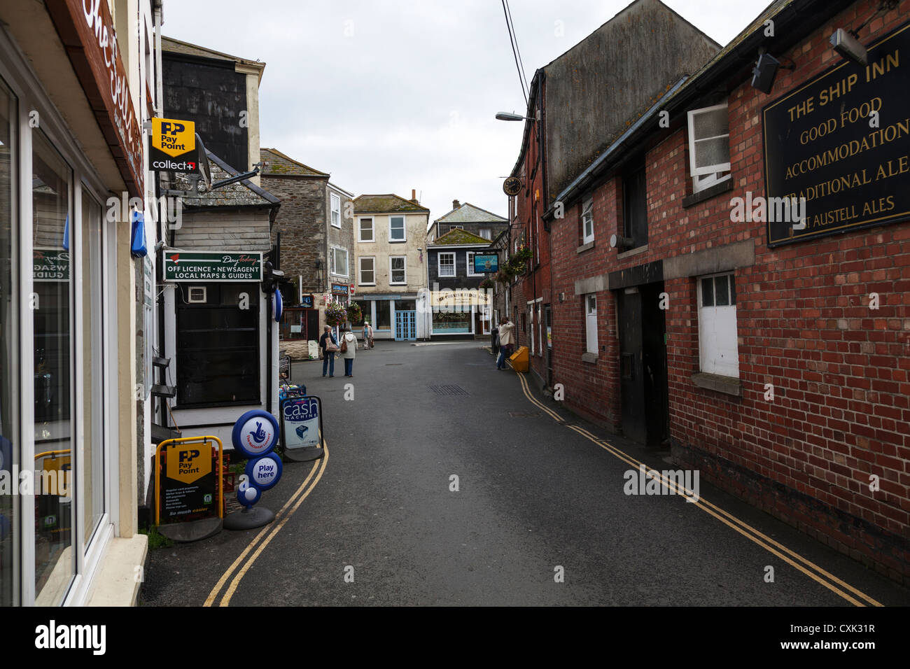 Mevagissey Cornwall main street and shops in this village Stock Photo Alamy