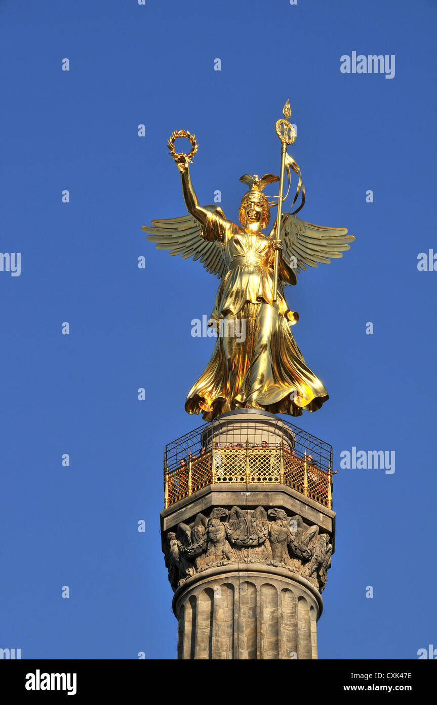golden statue at the top of Siegessaüle victory column Grossen stern Berlin Germany Stock Photo