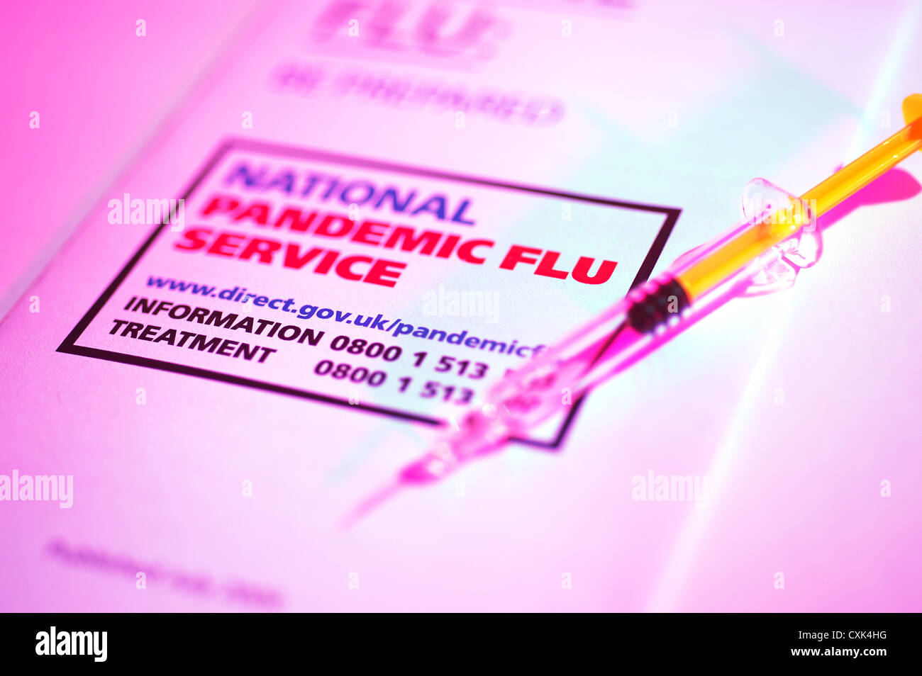 Swine Flu Be prepared National Pandemic Service UK government NHS leaflet with a needle and syringe of the flu vaccine Stock Photo