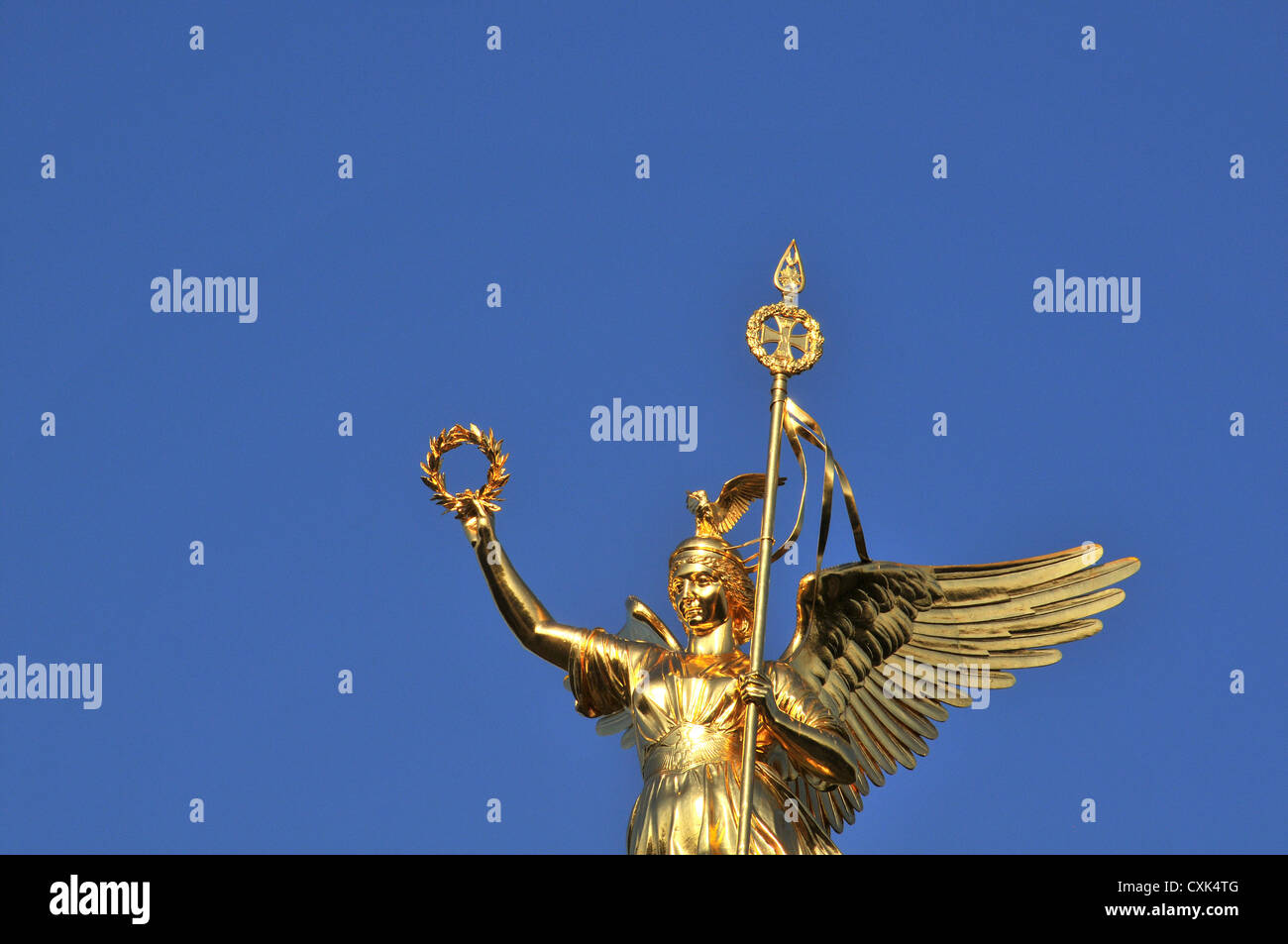golden statue at the top of Siegessaeule victory column Grossen stern Berlin Germany Stock Photo