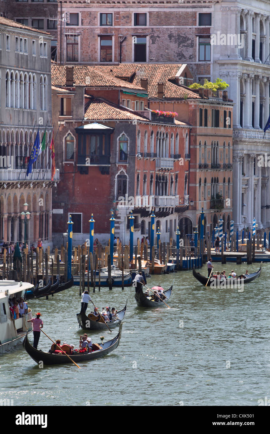 Gondolas on the Grand Canal near the Rialto bridge in Venice, Italy Stock Photo