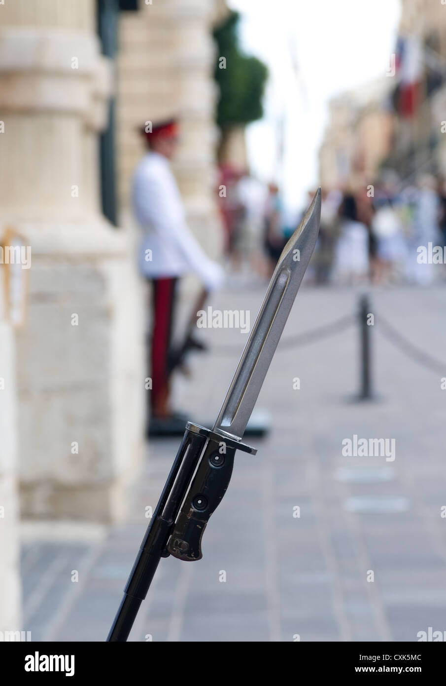 A maltese guard's bayonet fixed to an L1A1 SLR rifle Stock Photo