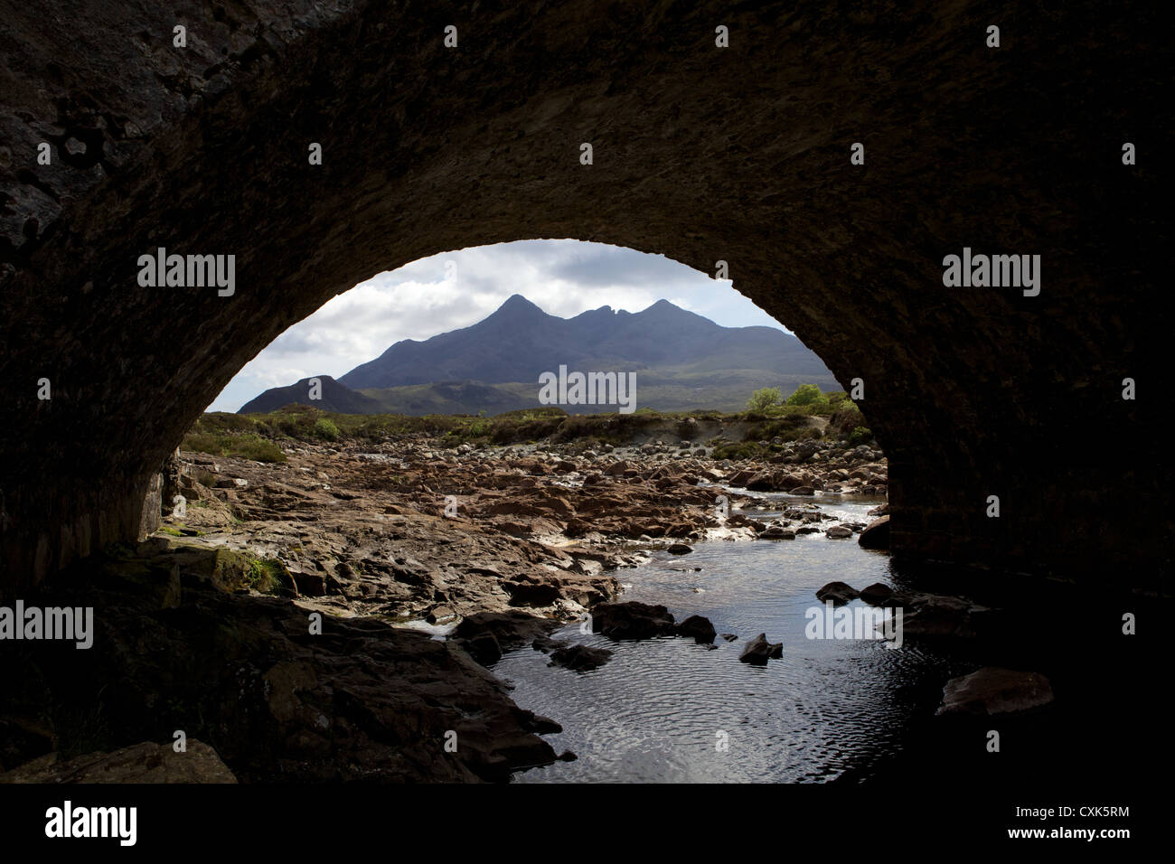 View towards Black Cuillin Mountains, through old bridge, Sligachan, Isle of Skye. Stock Photo