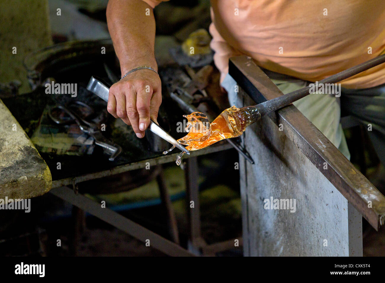 Glass blower making an ornamental horse in Murano, Venice, Italy Stock Photo