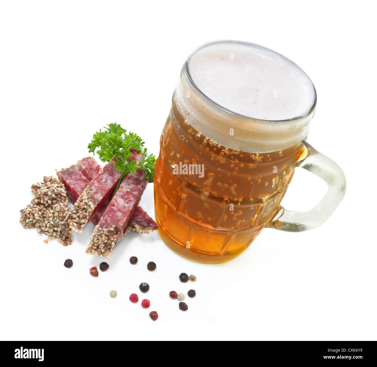 mug of beer and salami with parsley on a white background Stock Photo