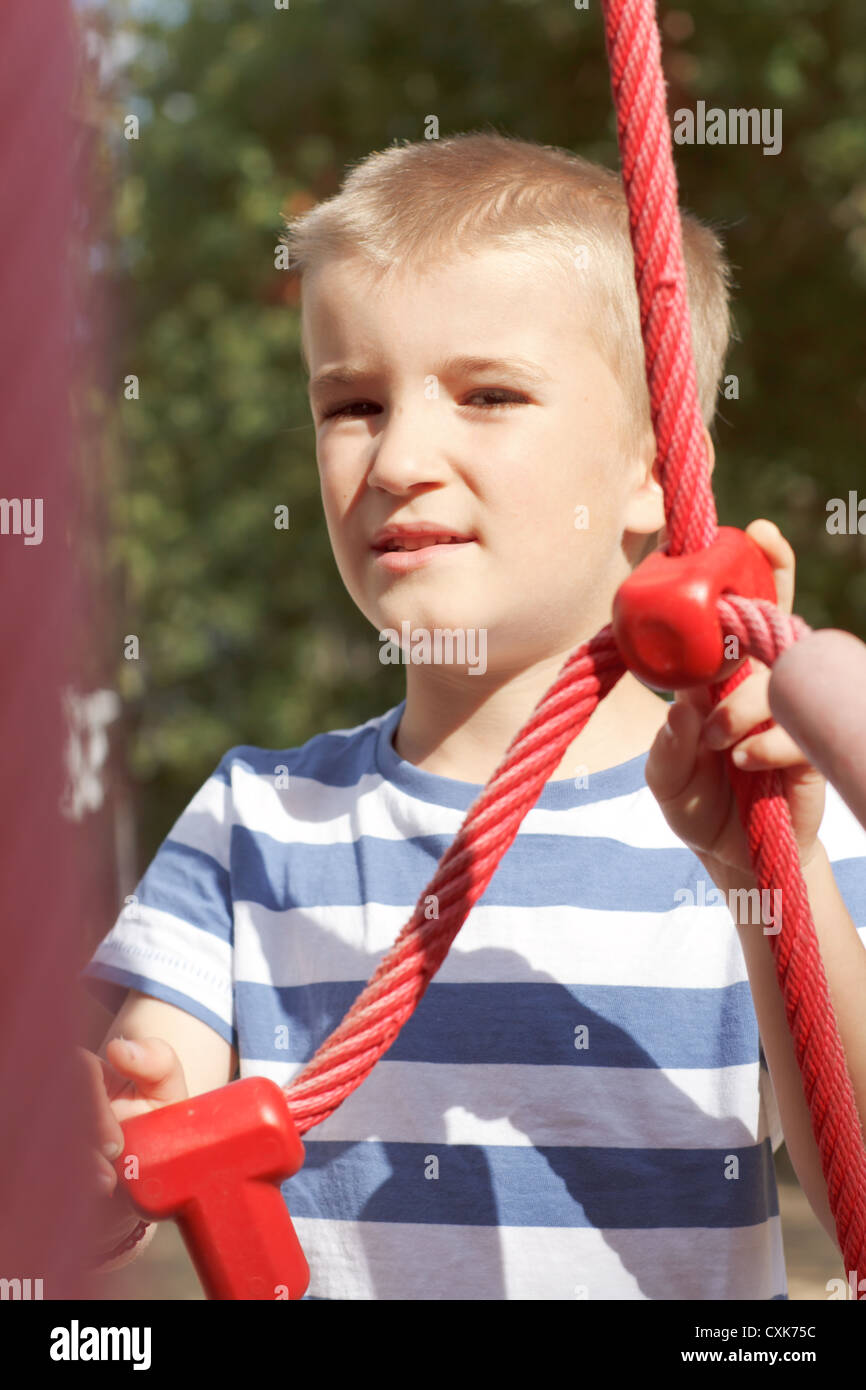 Boy Using A Rope Blond boy on rope outdoor hi-res stock photography and images - Alamy