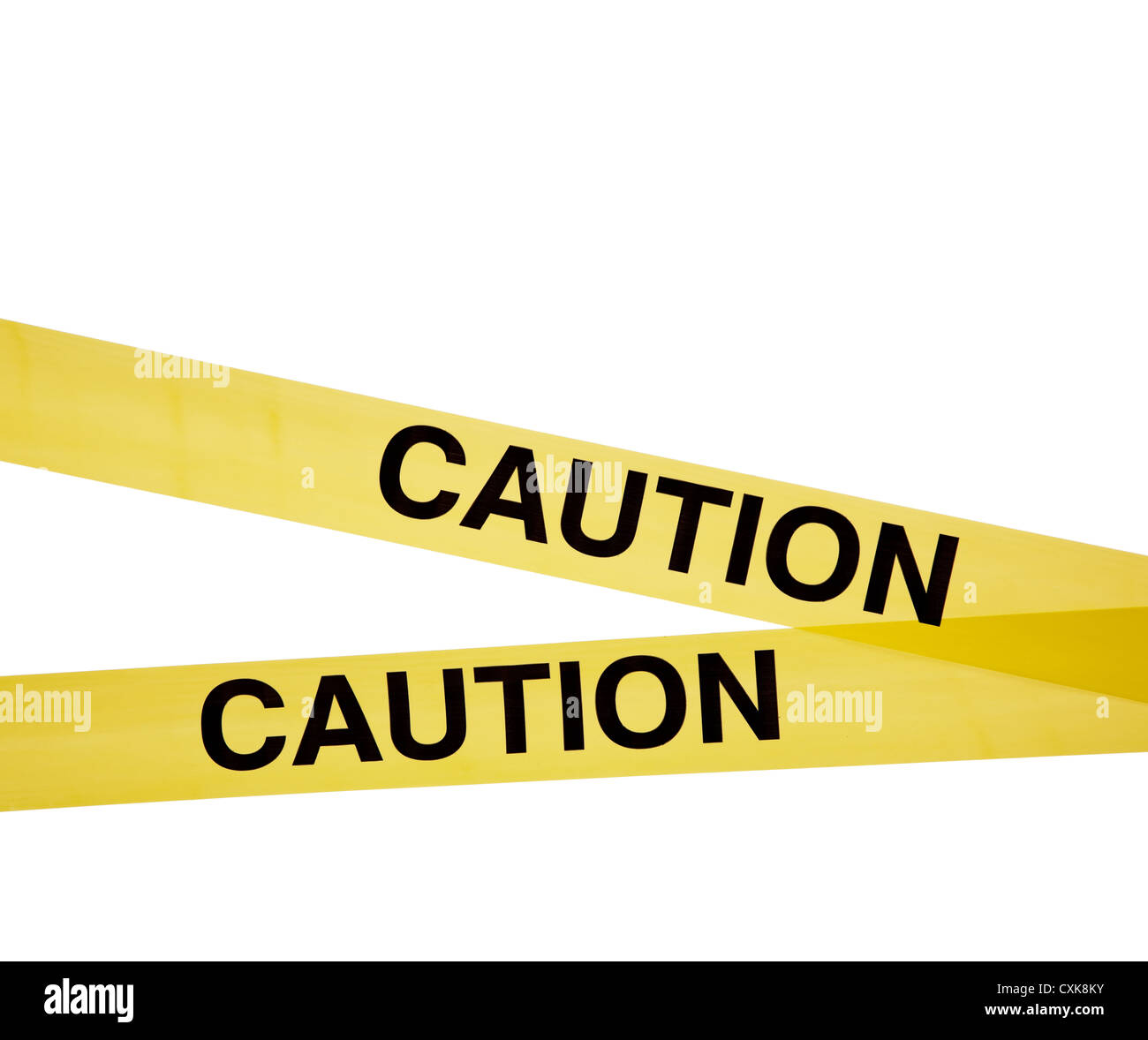 Yellow caution tape on a white background with copy space Stock Photo