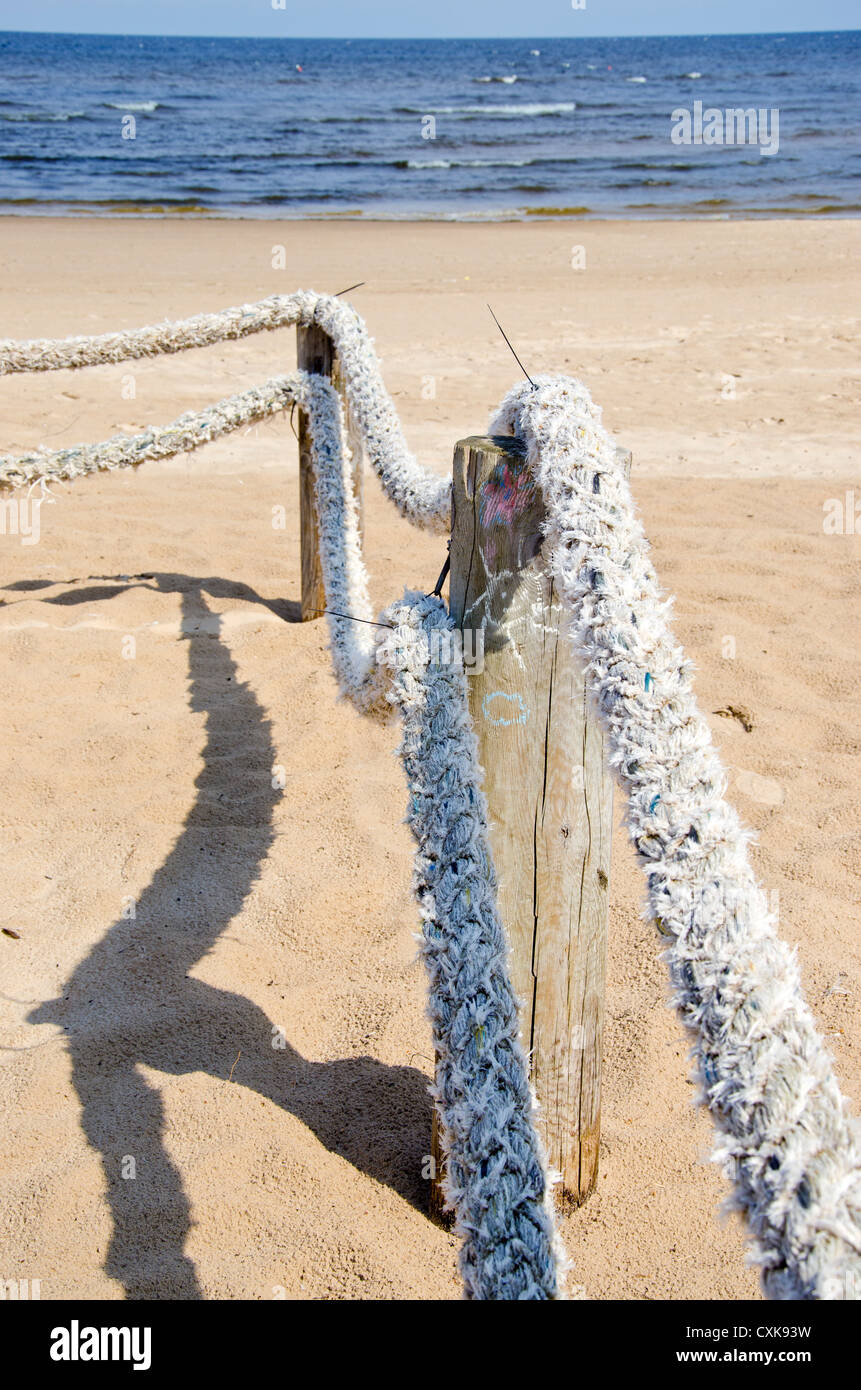 rope fence on summer sea resort beach Stock Photo - Alamy