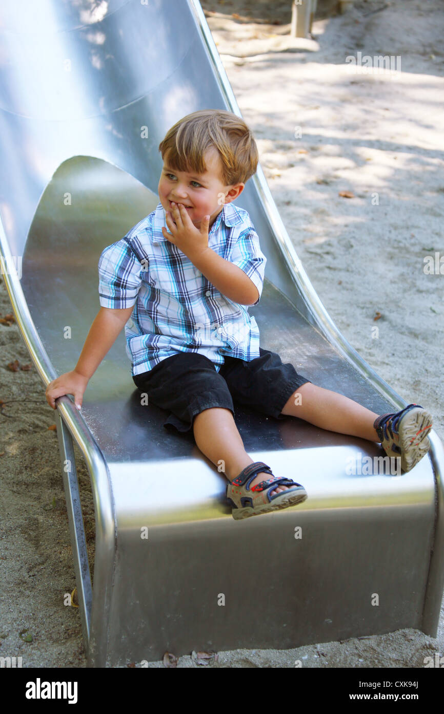 Child on the playground Stock Photo