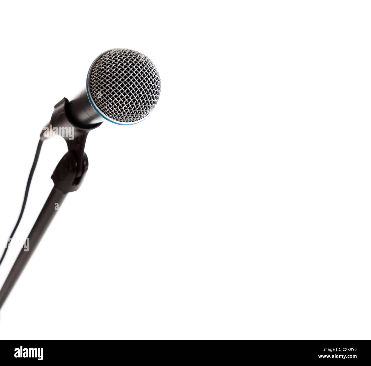 A microphone on the stand on a white background with copy space Stock Photo