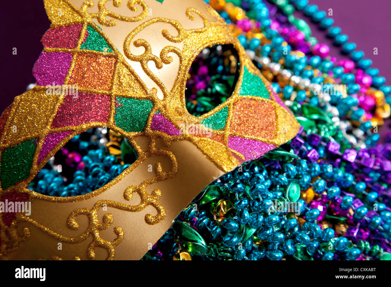 Mardi gras gold beads mask hi-res stock photography and images - Alamy