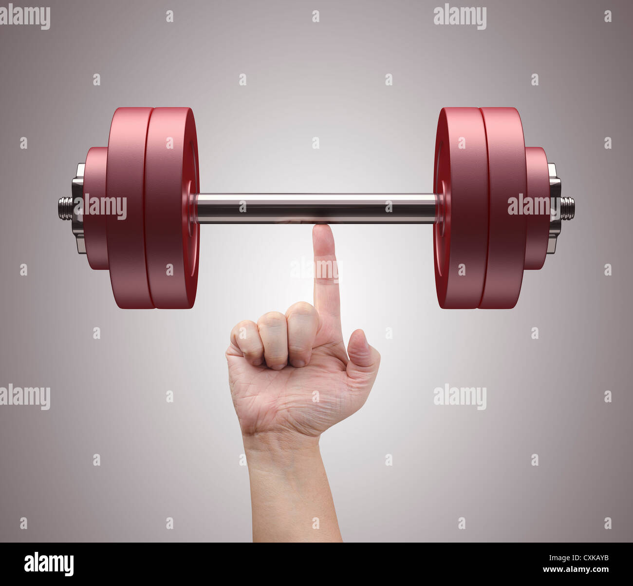 Weight lifting with just one finger. Concept of strength and training. Stock Photo