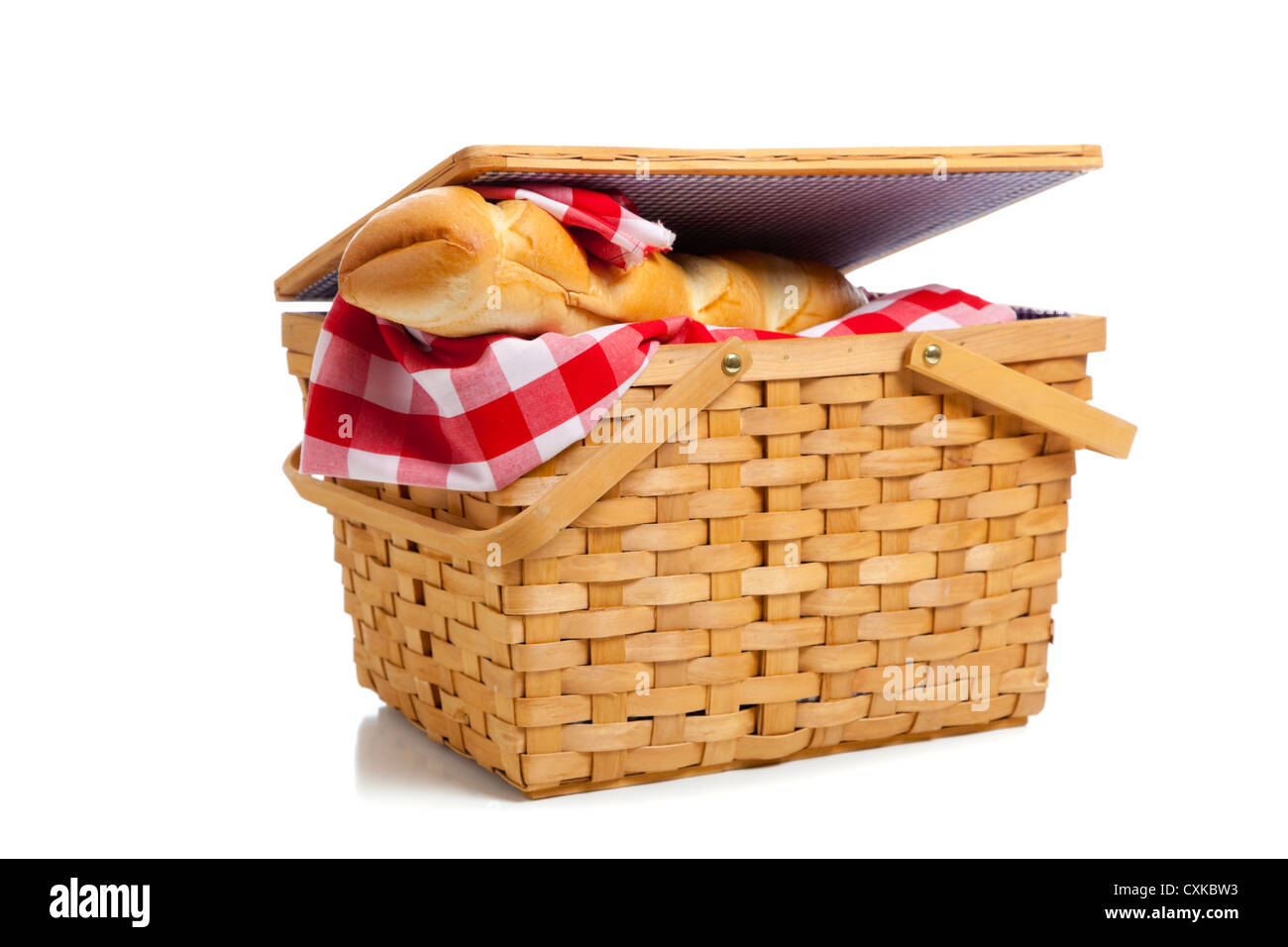 Red Gingham sticking out of a wicker picnic basket with French bread ...