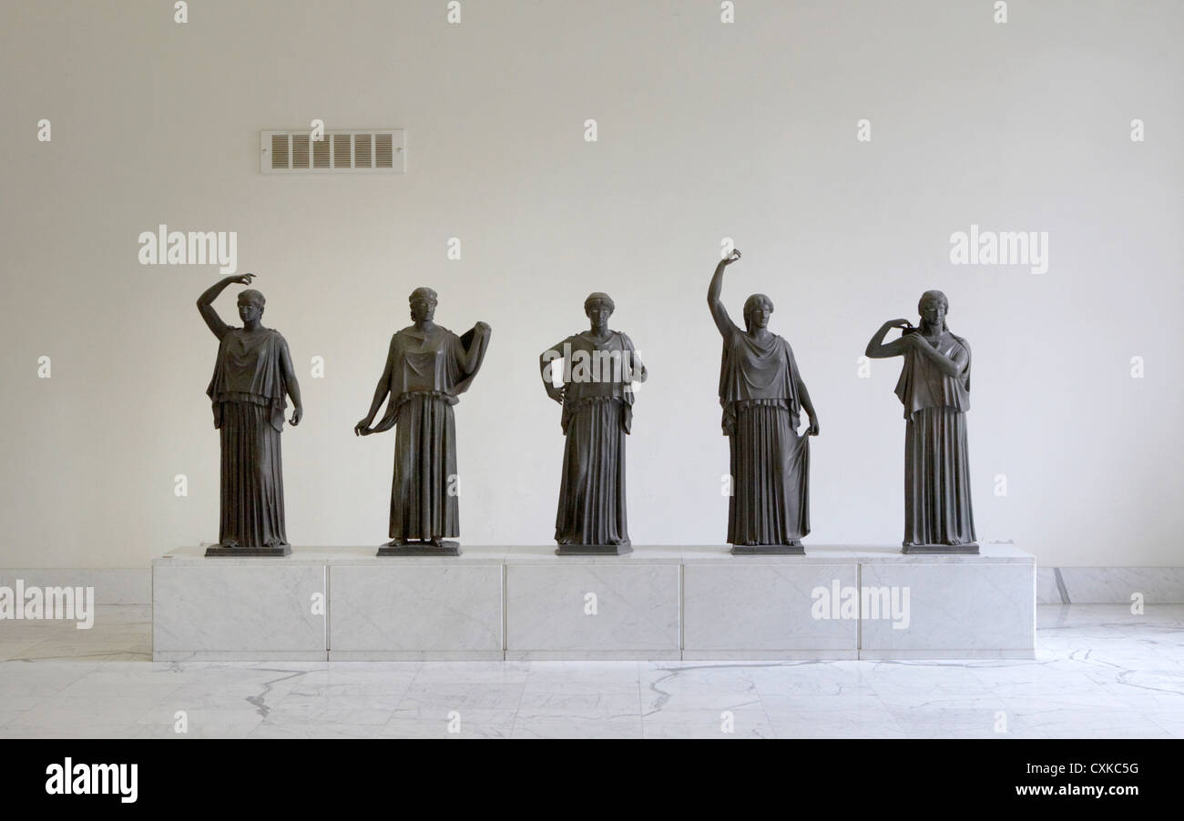 Bronze figures from Pompeii stand at the The National Archaeological Museum in Naples, Italy. Stock Photo
