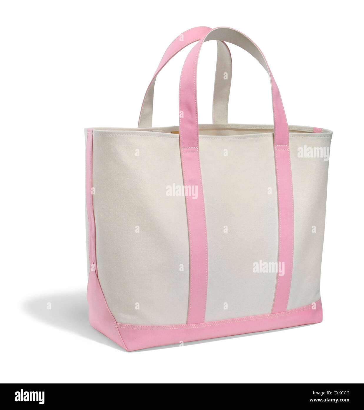 pink and white canvas bag photographed on a white background Stock Photo