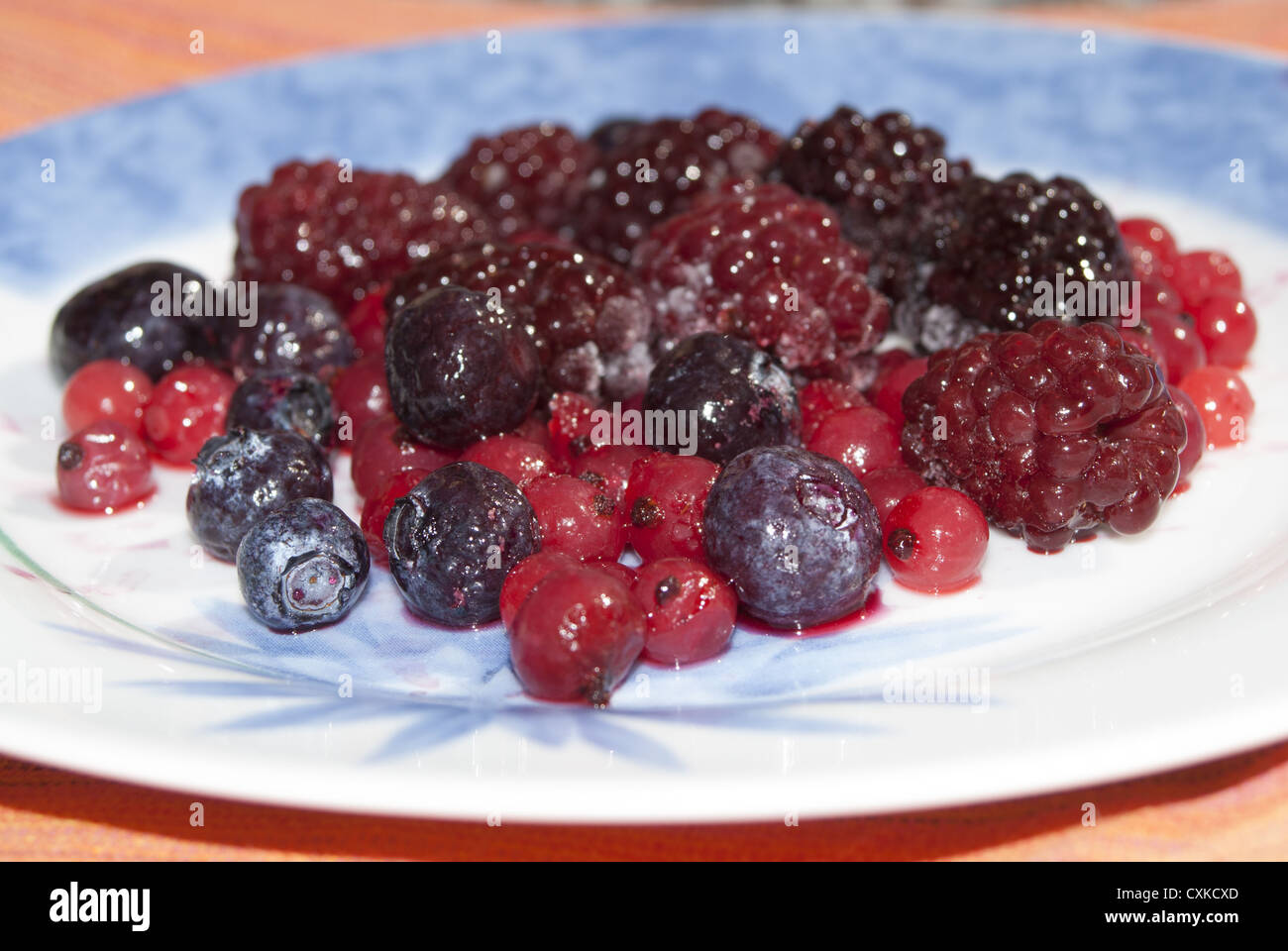 composition of berries: blackberries, blueberries, raspberries Stock Photo