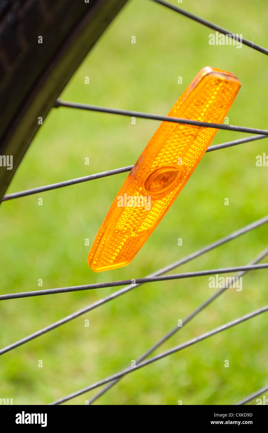 Safety reflector on bicycle wheel spokes Stock Photo Alamy