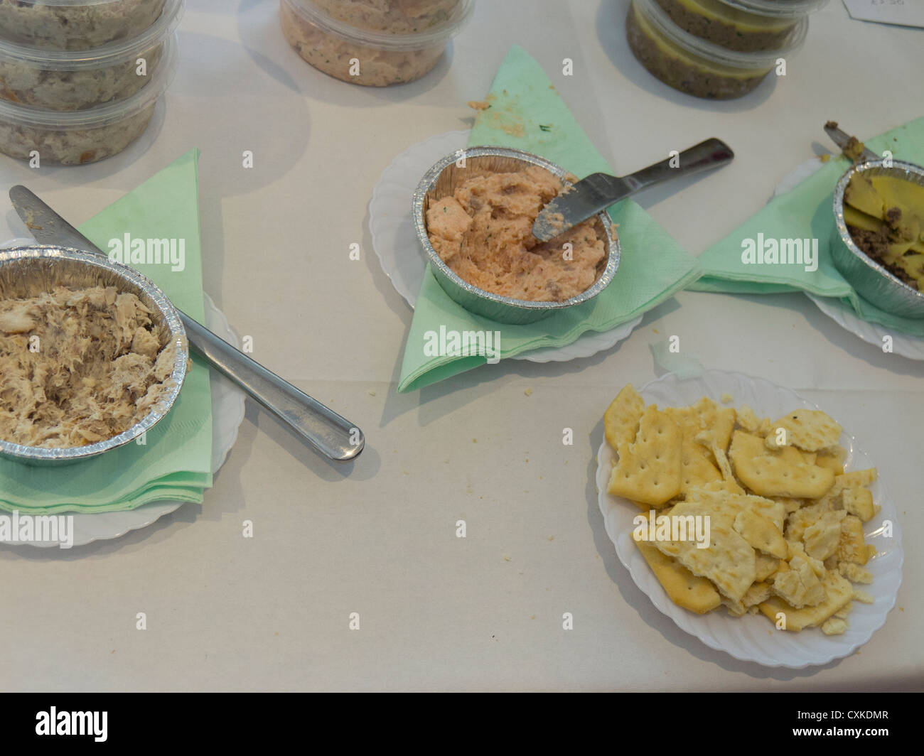 Food tasting area for local produce on a market table. Stock Photo