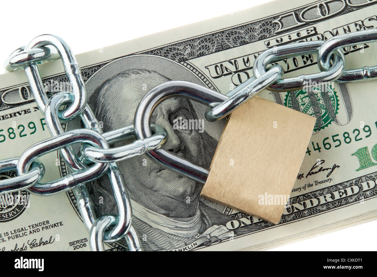 Dollar Currency notes with lock and chain. Stock Photo