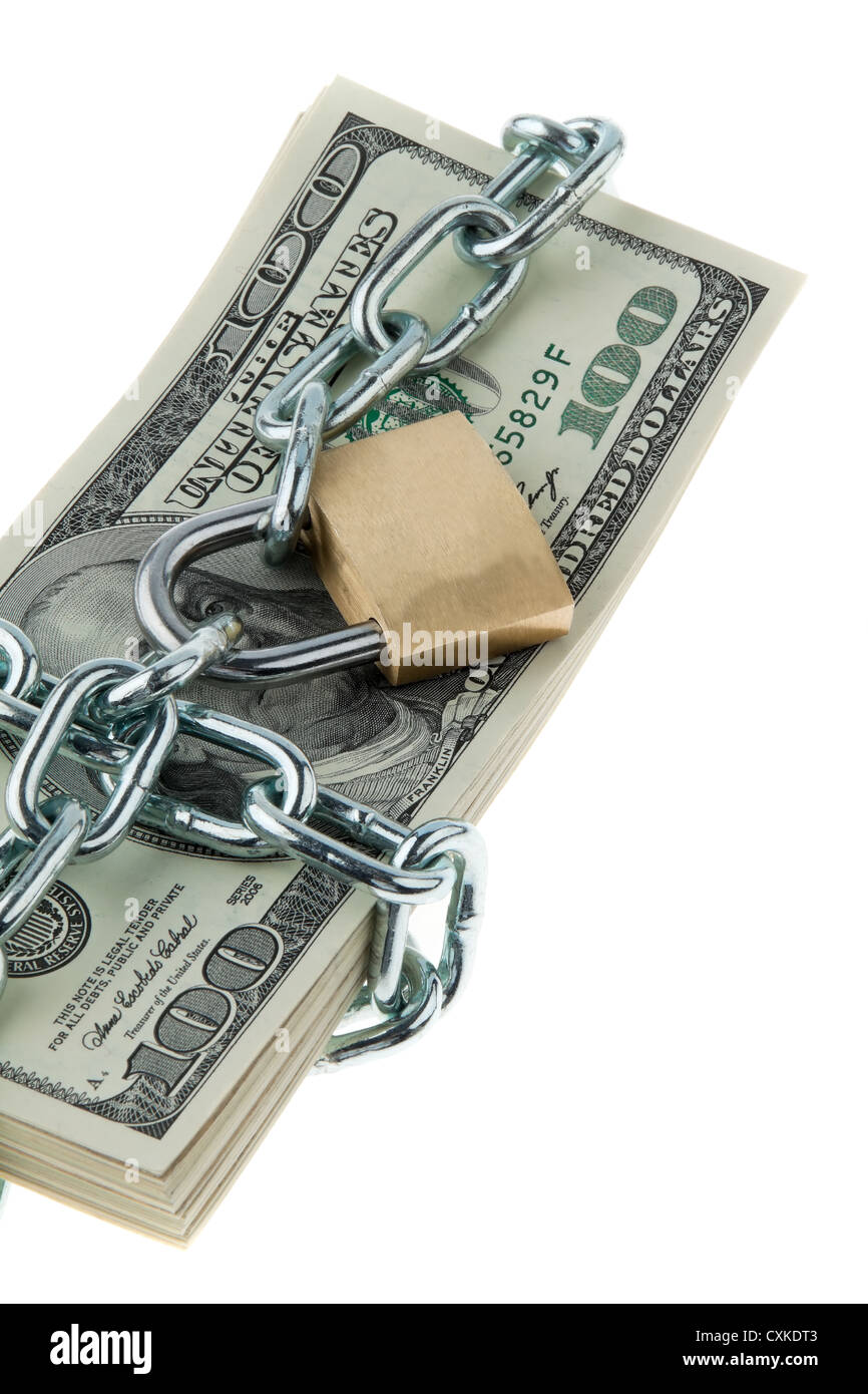 Dollar Currency notes with lock and chain. Stock Photo