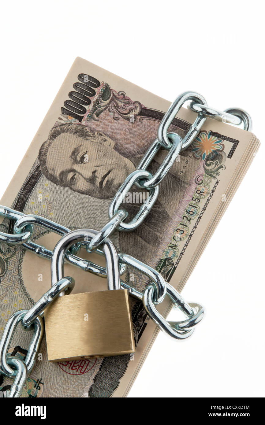Japanese yen notes with lock and chain Stock Photo