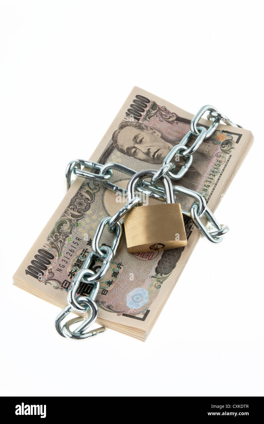Japanese yen notes with lock and chain Stock Photo