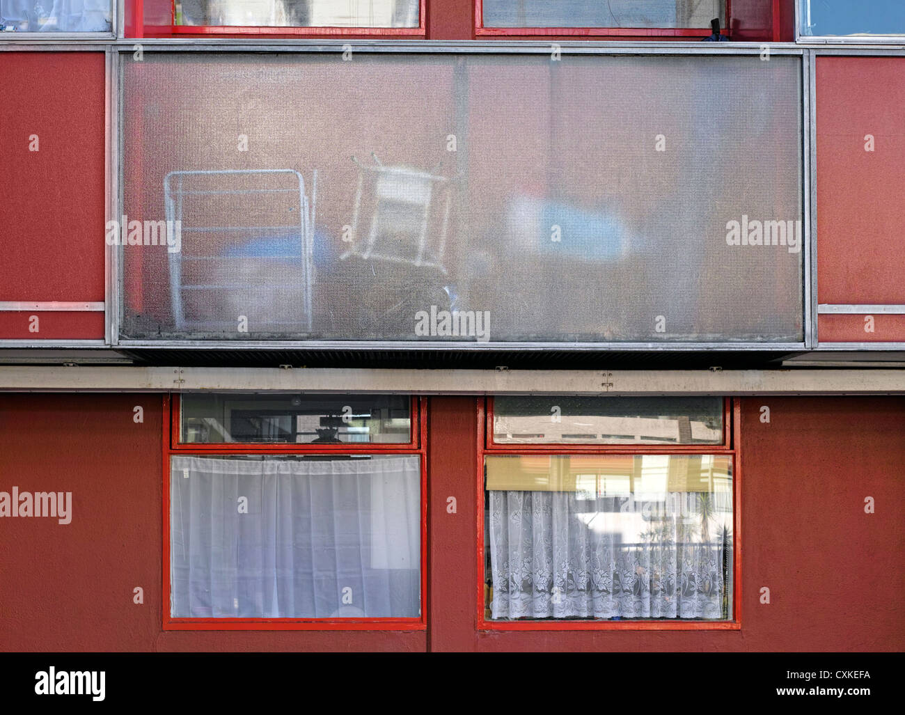 Windows in a London housing estate at Golden Lane Stock Photo