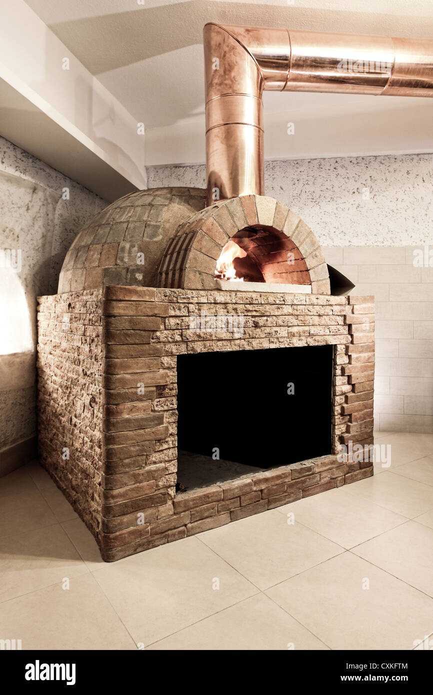 wood fired oven in a restaurant interior Stock Photo