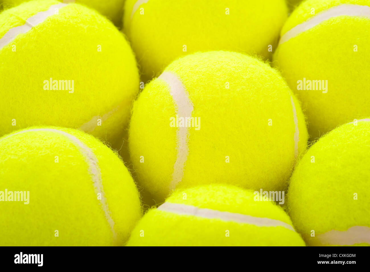Several tennis balls on a white background with copy space Stock Photo