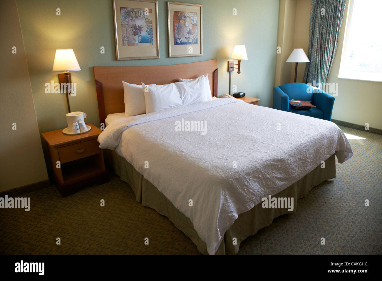 king size bed in a us hotel room miami florida usa Stock Photo