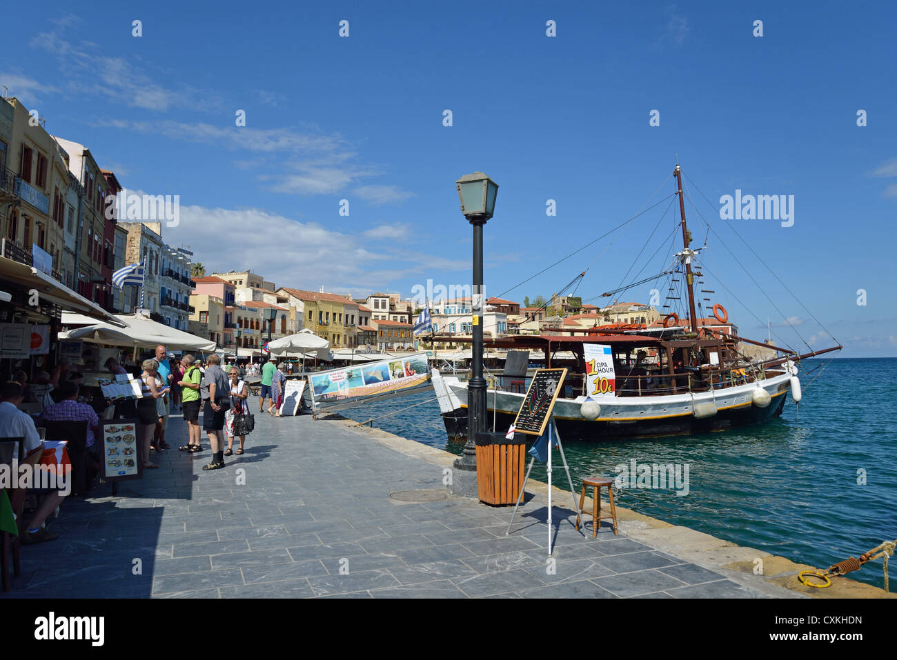 Restaurants on seafront promenade, Chania, Chania Prefecture, Crete, Greece Stock Photo