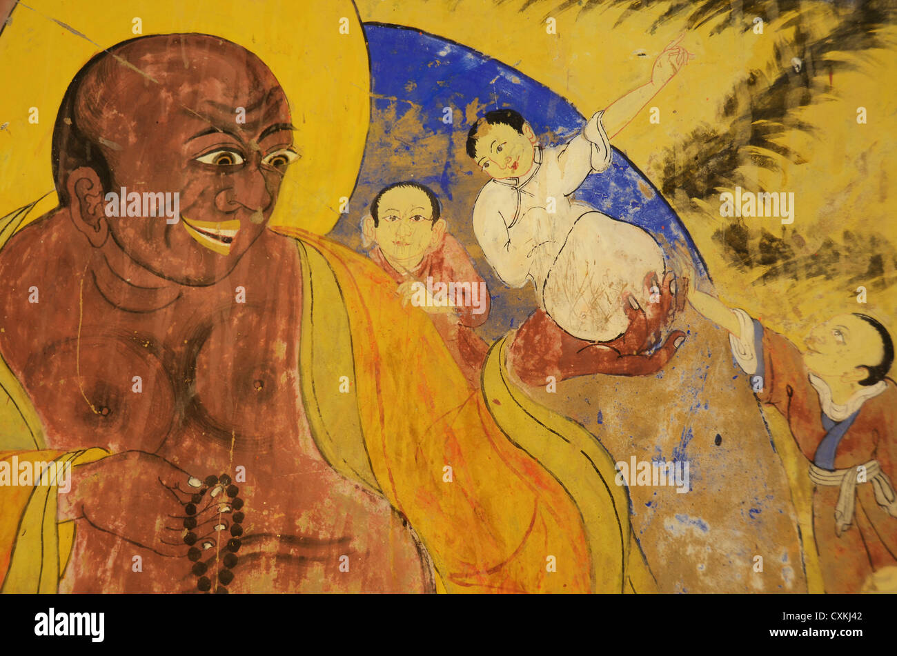 India, Ladakh, Thiksey, colorful wall painting with Buddhist images of