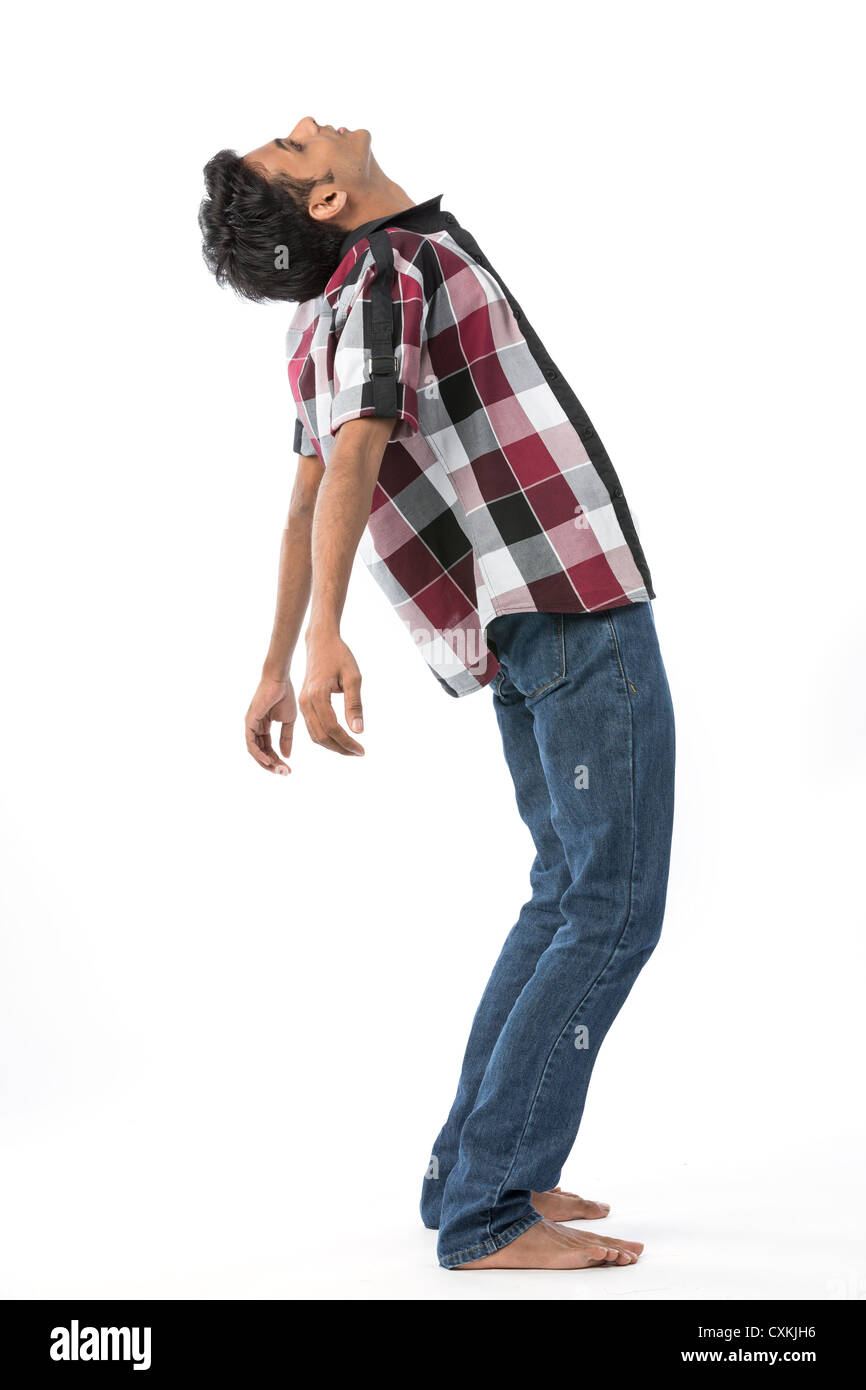 Young Indian man leaning backwards. Isolated on white background Stock Photo