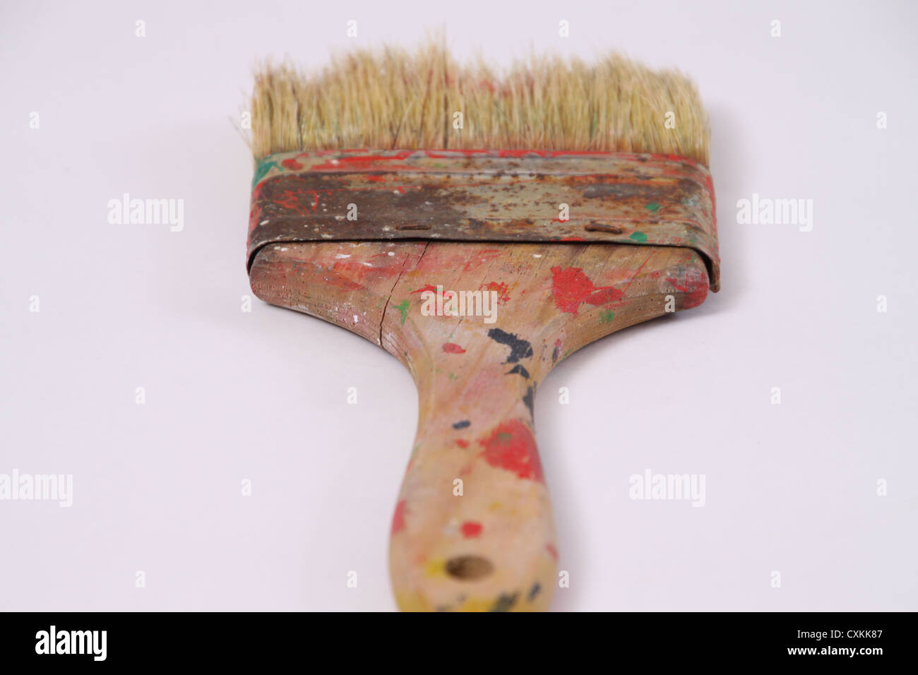 Weathered and worn paint brush. Stock Photo